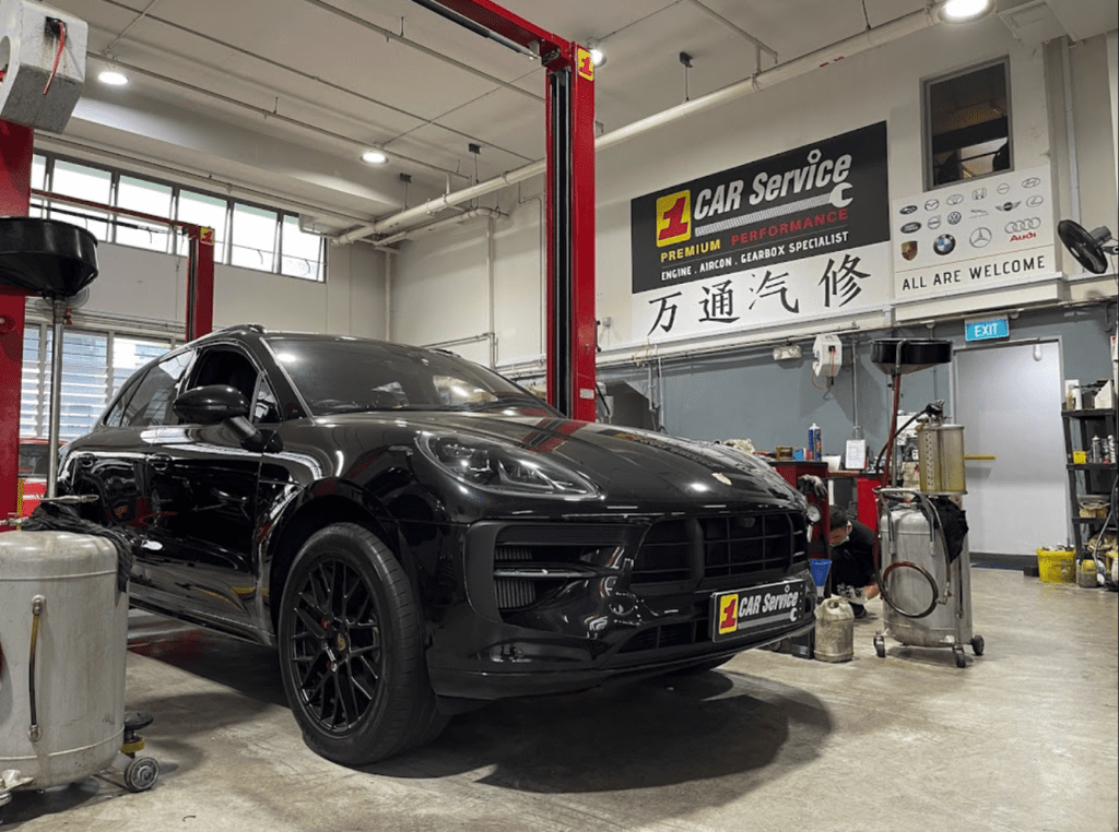 Experienced technicians providing professional Porsche servicing and repair at 1 Car Service Workshop in Singapore.