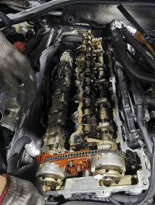 Dismantled engine components at the best engine overhaul in Singapore by 1 Car Service Workshop