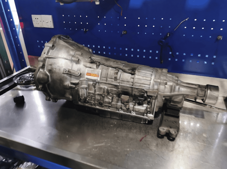 Technician performing the best gearbox overhaul in Singapore at 1 Car Service Workshop